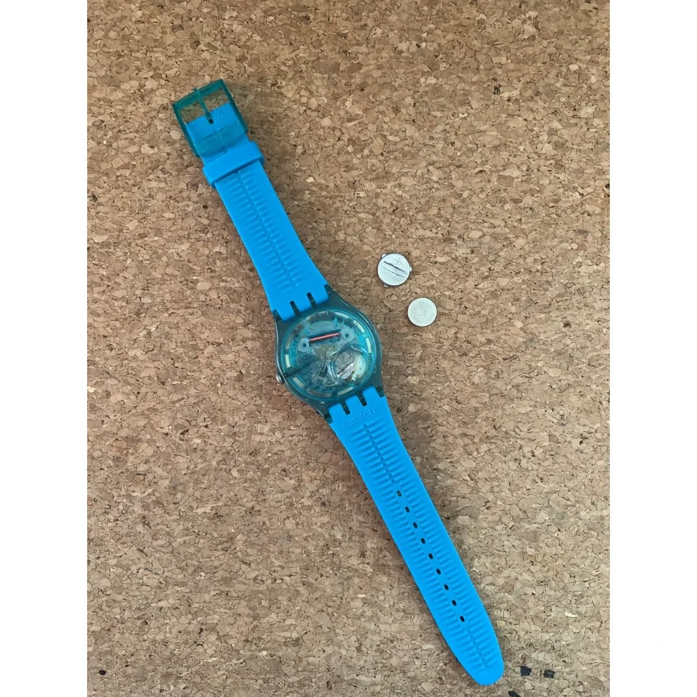 Swatch Blue Rebel SUON700 Day Date Blue Dial Silicone Strap Watch Vintage Swiss